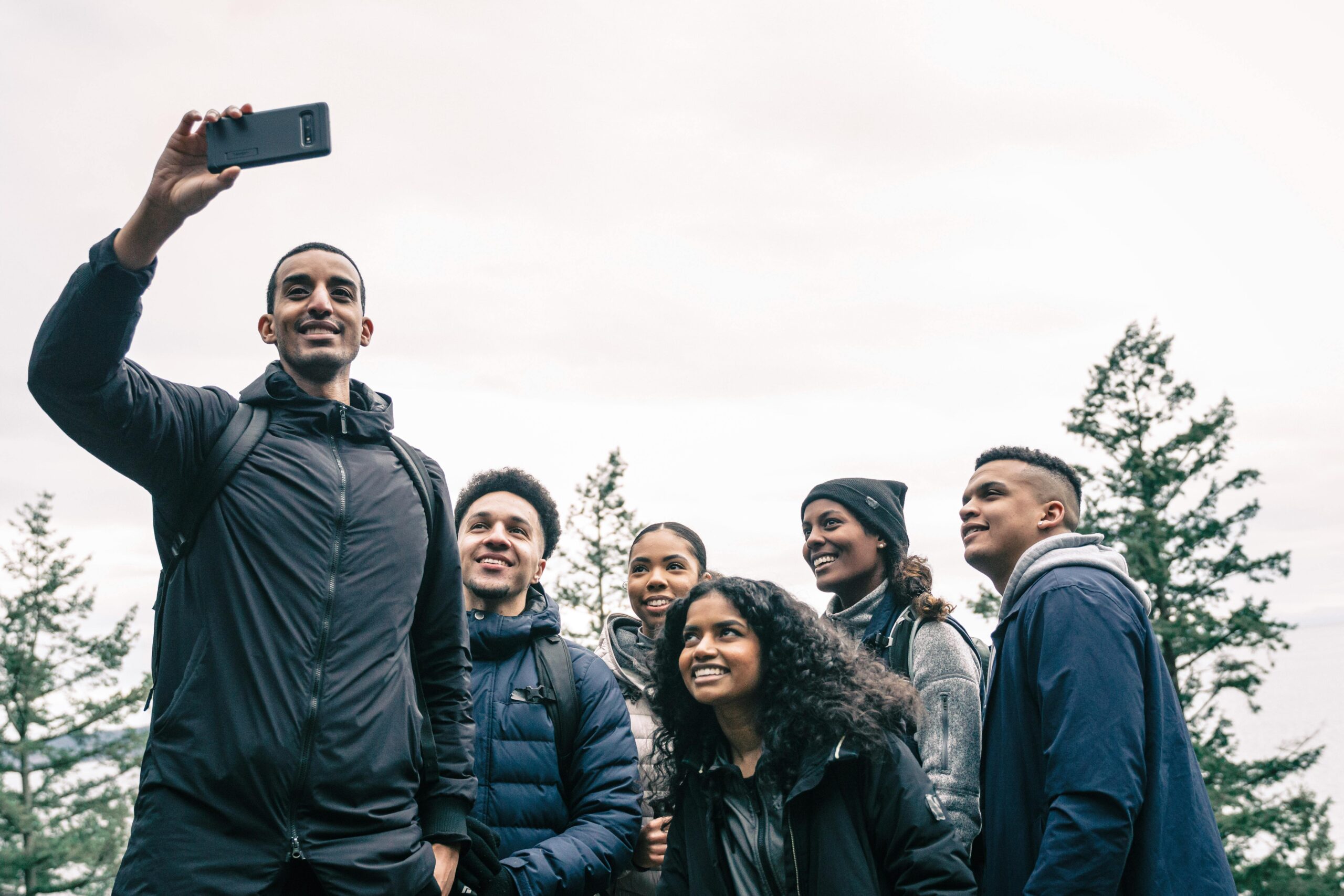 A group of travelers smiling during a guided shore excursion
