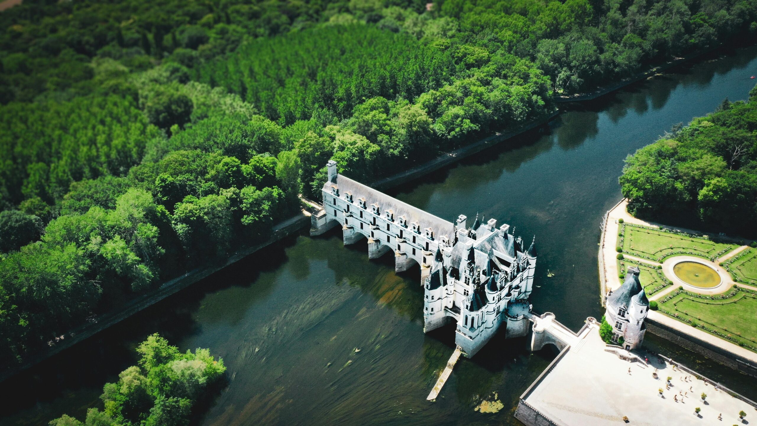A stunning aerial view of a famous local landmark surrounded by lush greenery