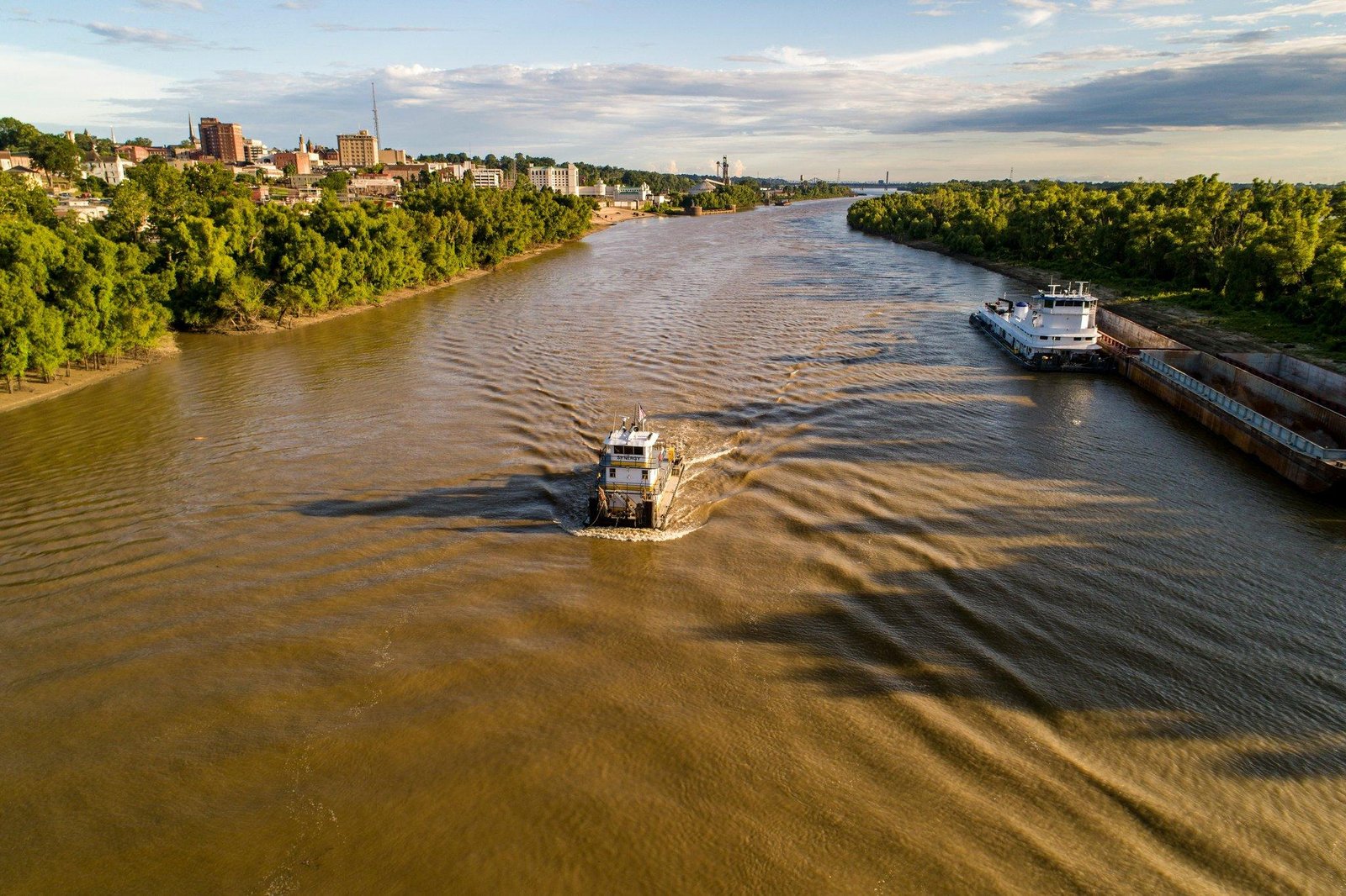 Emergency rescue boat approaching a stranded river cruiser