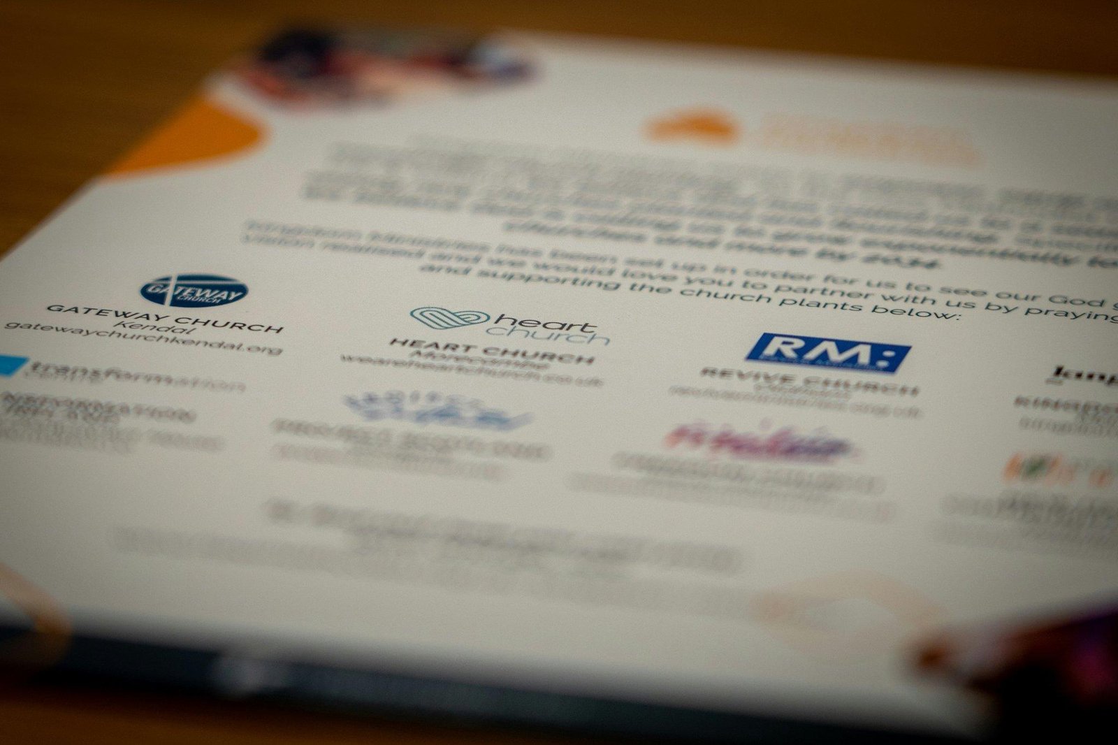 Tourists enjoying a zip line activity near a riverbank.