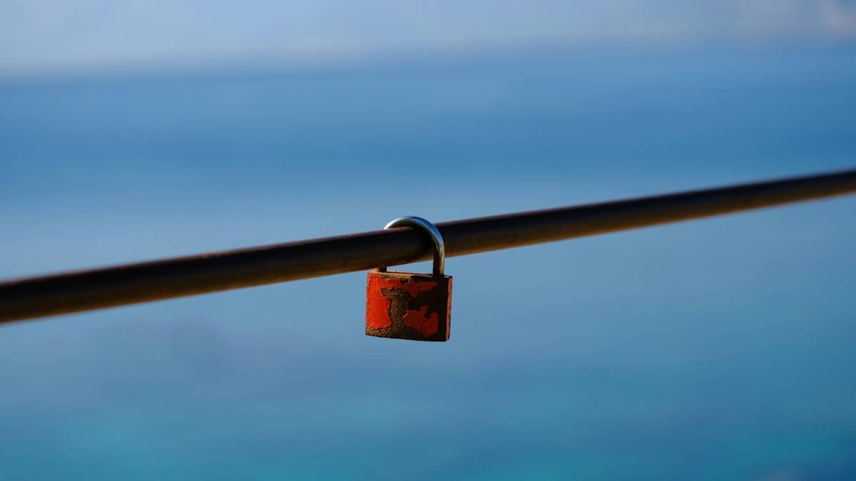 Scuba diver exploring coral reef with vibrant fish around