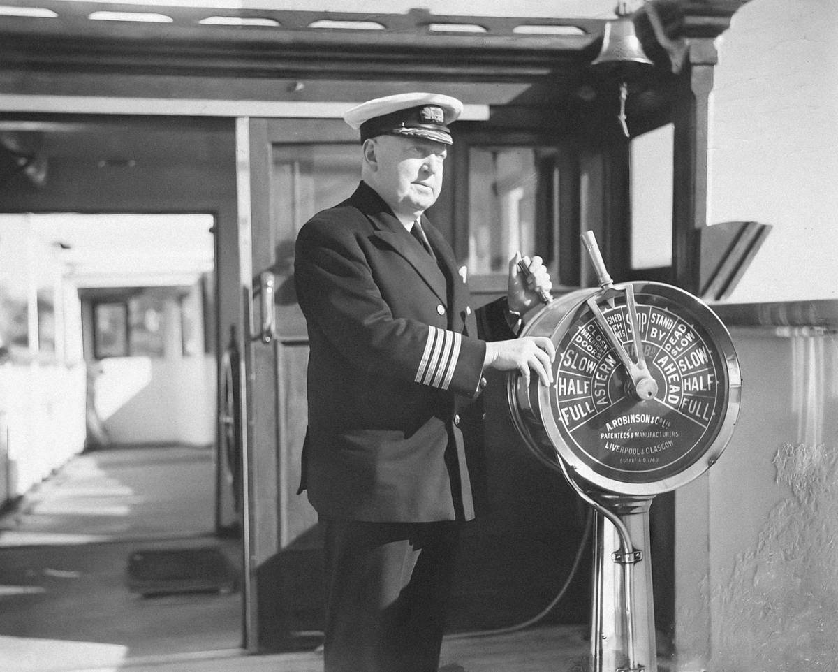 Portrait of Captain W M Jermyn on board SS LARGS BAY, 1929-1936 This photograph depicts Captain W M Jermyn on board the Aberdeen and Commonwealth Line's SS LARGS BAY. Jermyn was in command of the vessel from 1929 to his retirement in 1936. By the time he became captain of LARGS BAY, he had served over 40 years with the Aberdeen Line and under his command had carried over 38,000 troops over a distance of 320,000 miles during World War II.