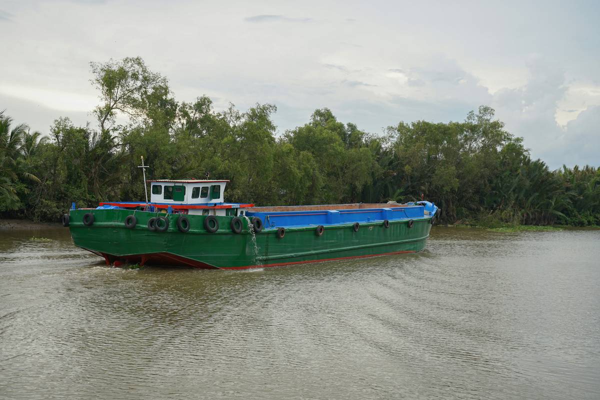what is inland marine insurance definition: river cruise boat docked with damaged equipment on deck